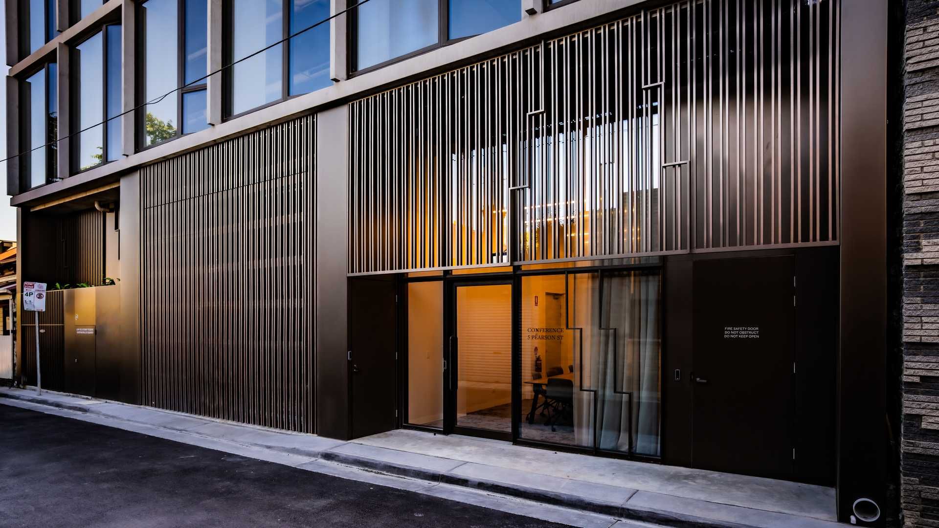 Tower Batten Series cladding on a modern façade at dusk